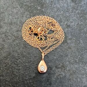 Catbird brooklyn NY rose gold necklace with rose gold teardrop with diamond.